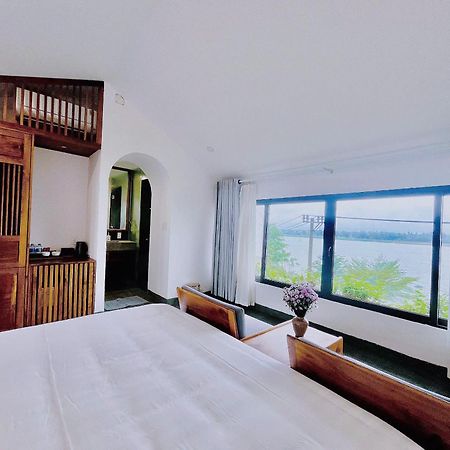 Serene Riverside Hotel Hoi An Exterior photo