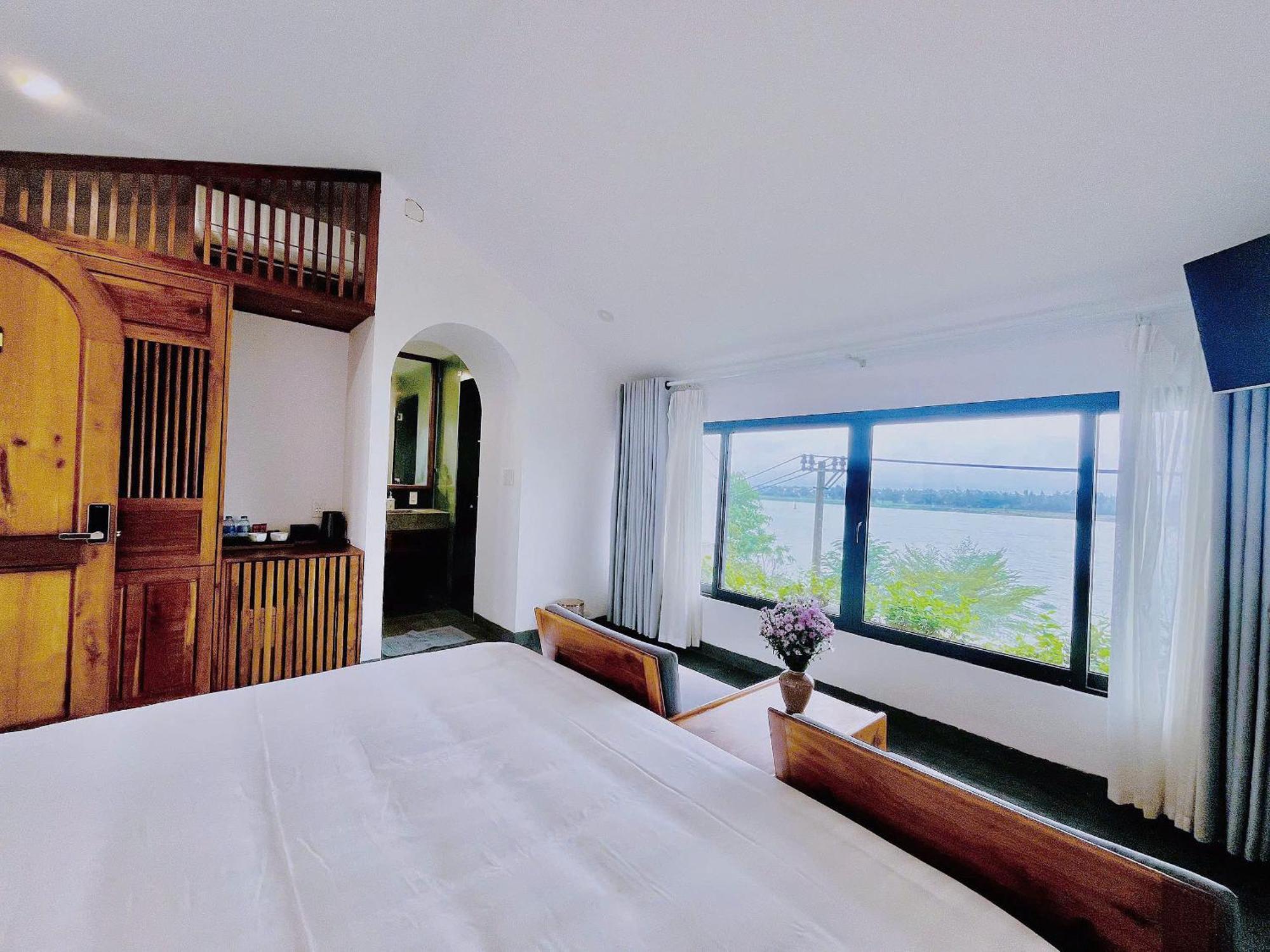 Serene Riverside Hotel Hoi An Exterior photo