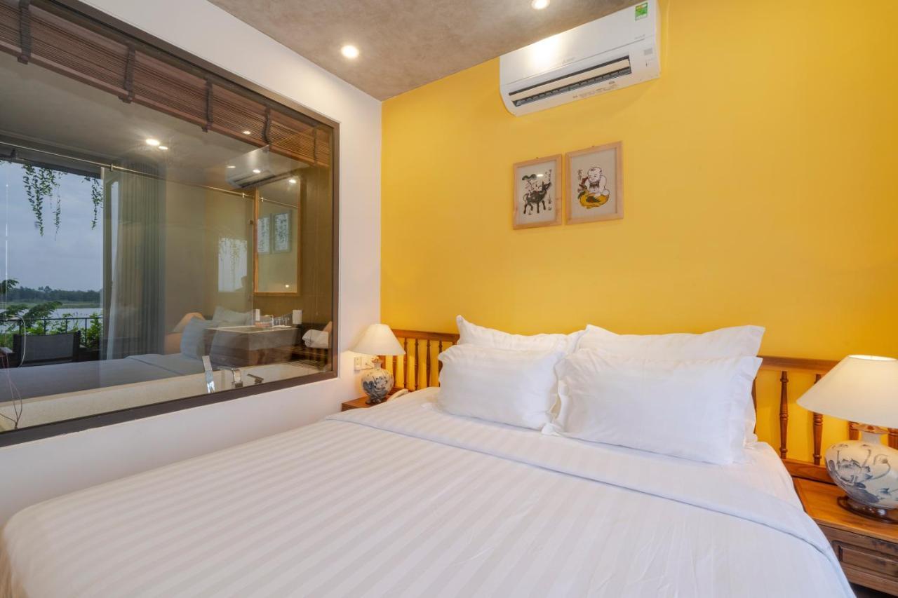 Serene Riverside Hotel Hoi An Exterior photo
